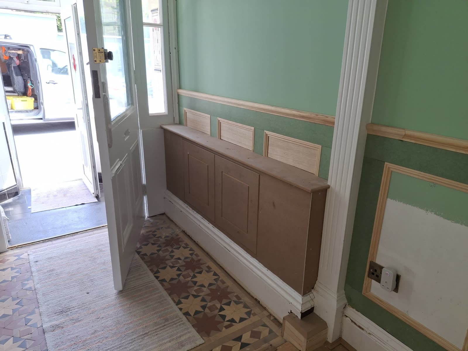 Hallway panelling and fitted bench