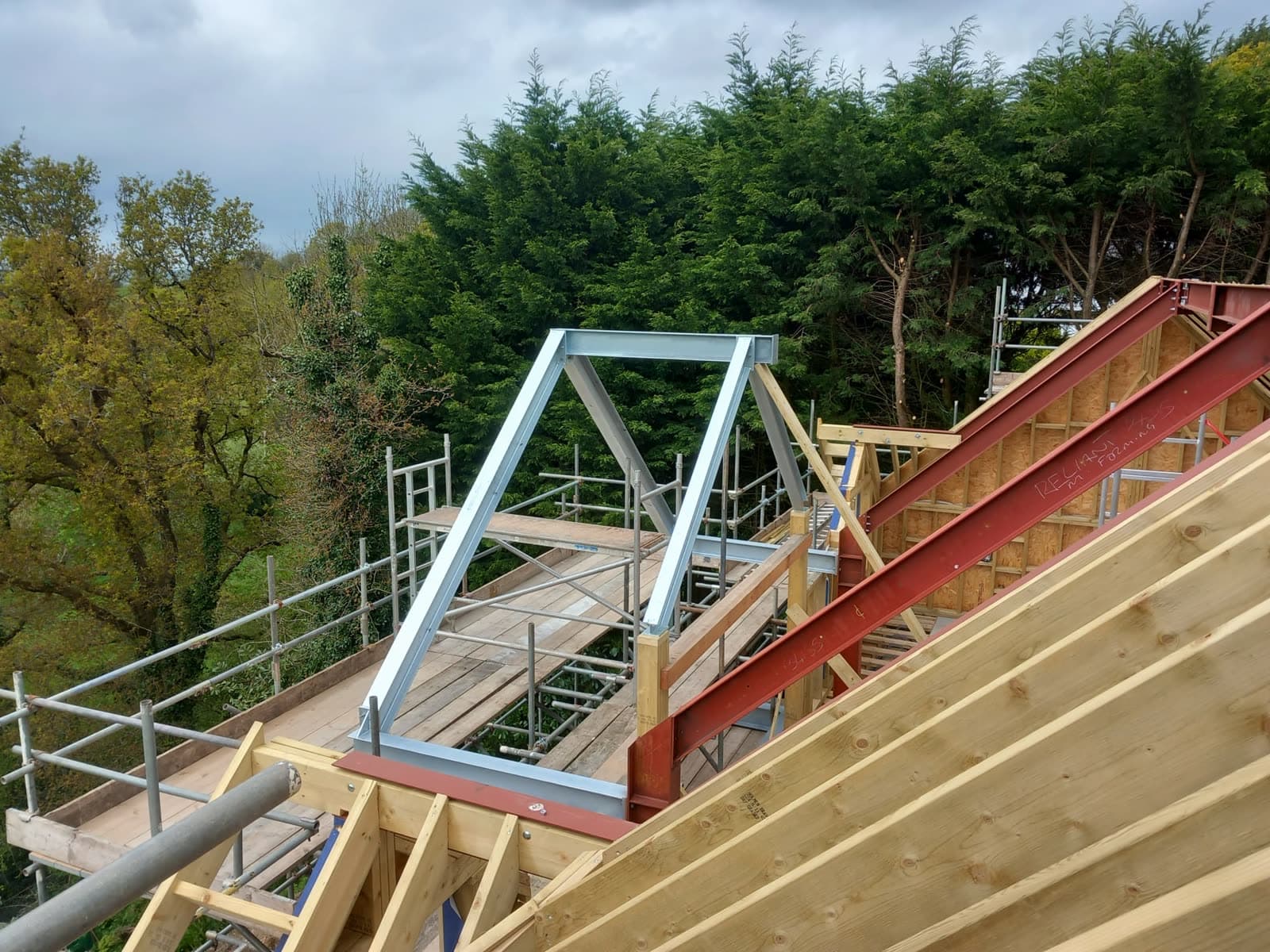 Steel truss and timber rafters